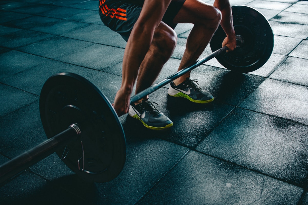 Two people training together at a gym